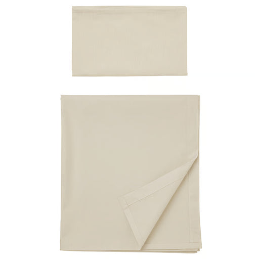 IKEA DVALA cotton flat sheet and pillowcase set in beige, folded and stacked #40627778
