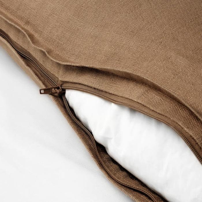 : IKEA DYTÅG dark beige cushion cover with black cushions on light grey couch