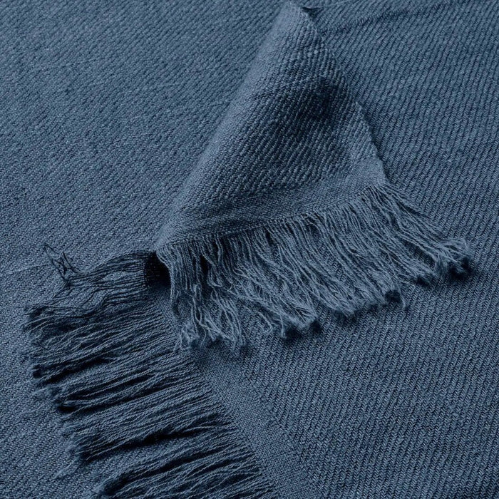 Close-up of the dark blue IKEA DYTÅG throw blanket