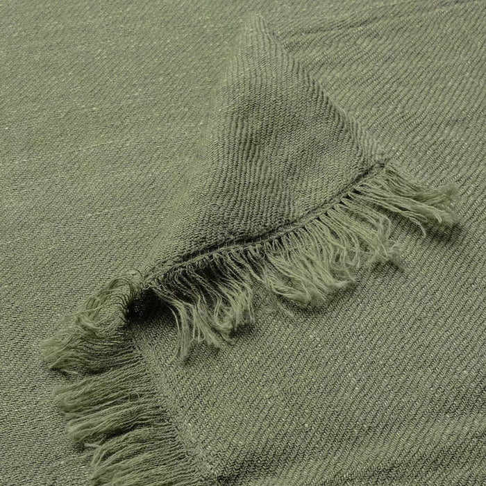 "Close-up of IKEA DYTÅG grey-green throw blanket showing detailed fringed edges"