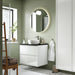 IKEA EKOLN beige soap dispenser on bathroom shelf styled in a minimal bathroom setting