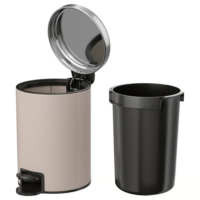 IKEA EKOLN beige waste bin with lid closed, shown in a home setting