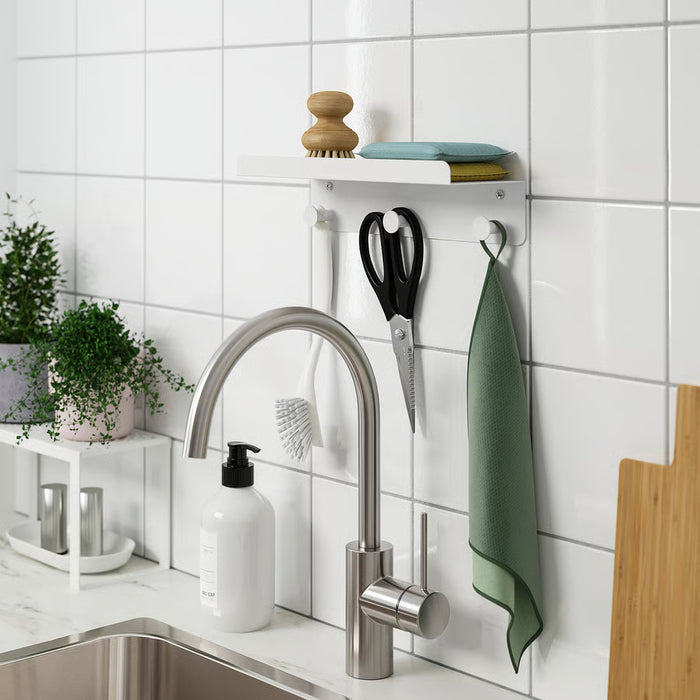  Close-up of IKEA ENUDDEN white powder-coated hooks and shelf edge detail