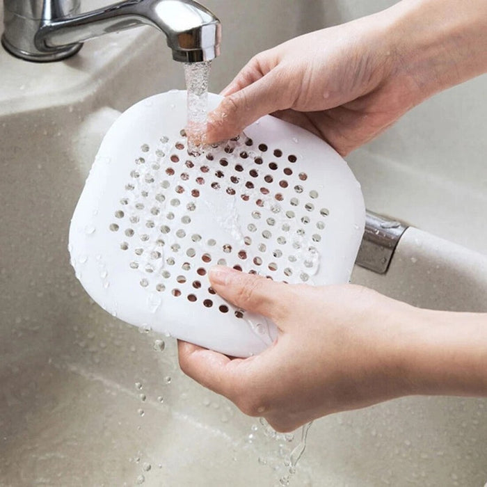 Bathtub drain cover with odor-blocking seal – keeps water flowing & traps hair efficiently.