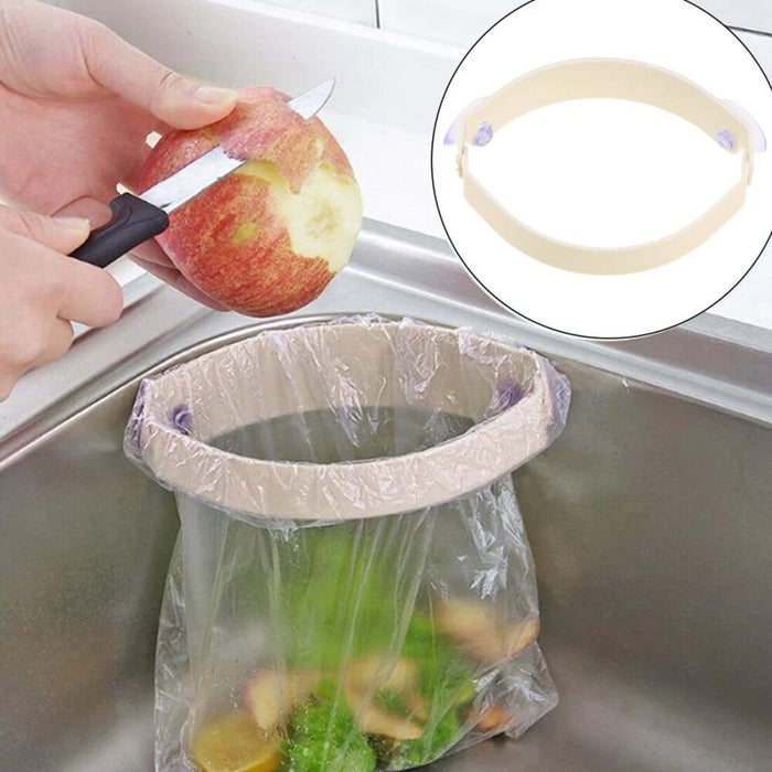 Adjustable kitchen sink strainer clip - holds food waste for easy disposal, prevents drain clogs