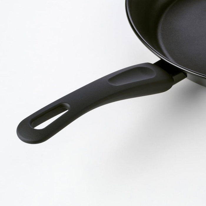 IKEA HEMLAGAD Frying pan, non-stick coating black, 24 cm  with  LÄMPLIG Trivet, stainless steel, 50x28 cm.