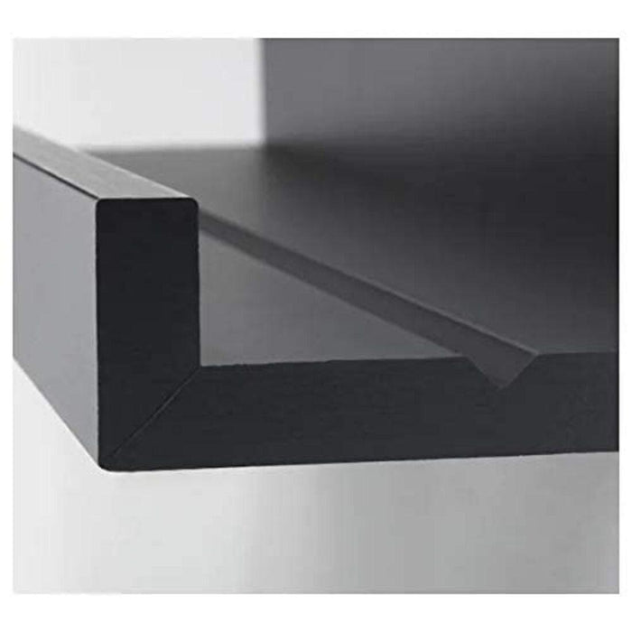 Close-up of IKEA MOSSLANDA black picture ledge with minimalist design 50297466