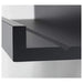 Close-up of IKEA MOSSLANDA black picture ledge with minimalist design 50297466