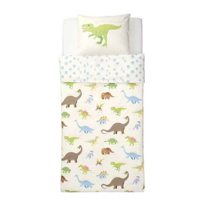 IKEA JÄTTELIK duvet cover and pillowcase set with playful dinosaur print on a white background, size 150x200 cm (59x79 inches) and 50x80 cm (20x32 inches).70464119