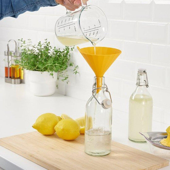 IKEA UPPFYLLD Funnel, 13 cm, bright yellow with VINTERFINT Bottle with stopper, glass red, 0.5 l (17 oz)