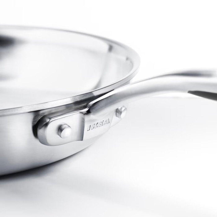 Ikea SENSUELL Frying pan, stainless steel/grey, 24 cm with  LÄMPLIG Trivet, stainless steel, 50x28 cm.