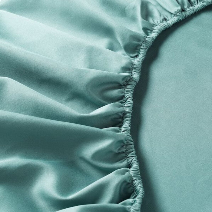 A closeup image of ikea fitted sheet of Extra soft and durable quality since the bedlinen is densely woven from fine yarn 