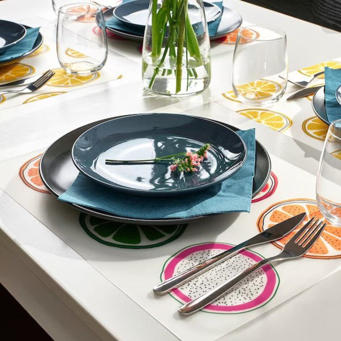 A set of patterned place mats in various colors and designs, offering versatility and style for any table decor 00557150