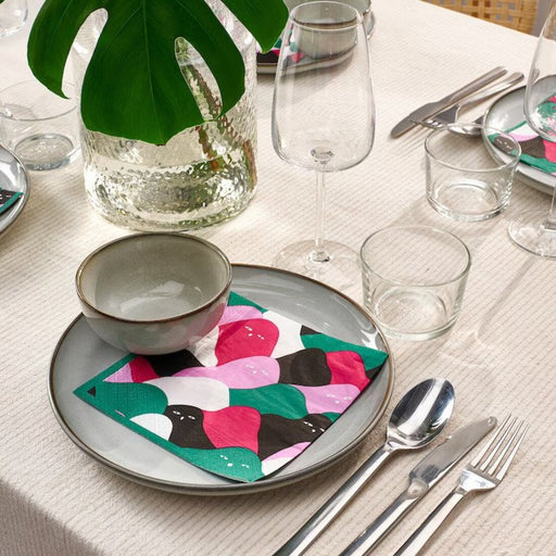An image of Patterned multicolour paper napkin placed on a table, measuring 33x33 cm (13x13 inches) 70553573