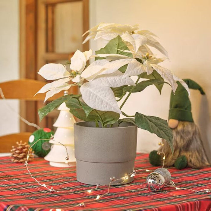 IKEA VINTERFINT Poinsettia/white Artificial Plant in a modern pot suitable for any home decor.