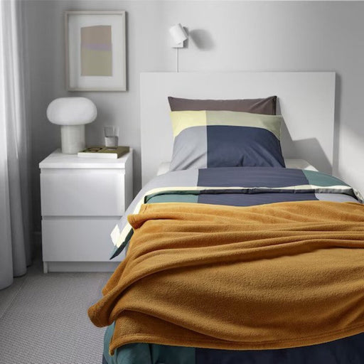 Elegant TRATTVIVA bedspread in a warm yellow-brown hue