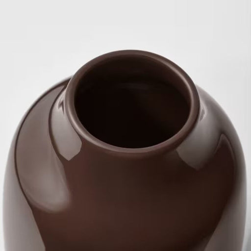 IKEA Vase: A striking brown vase that adds a pop of color to any room.50554074