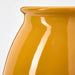 KEA Vase: A striking yellow vase that adds a pop of color to any room.
