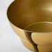 Close-up of the elegant brass finish on IKEA AROMATISK Serving Bow