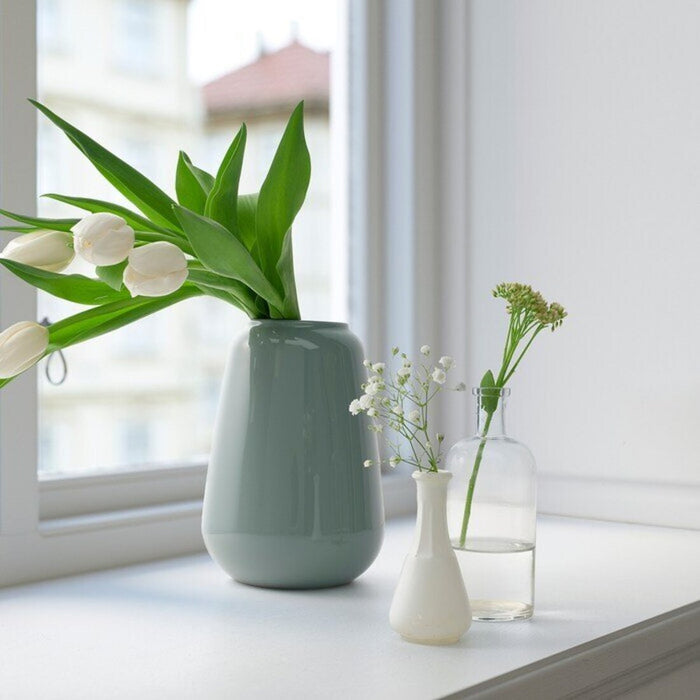 Beautiful floral arrangement in the IKEA LIVSVERK Vase, showcasing the perfect blend of light blue-grey elegance (21 cm)