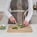 An eco-friendly and sustainable bamboo chopping board from IKEA, featuring a stylish design.-80570671