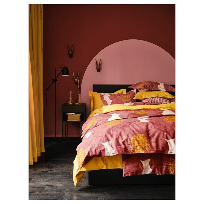 A visual of a light pink and dark pink duvet cover set spread elegantly over a bed, showcasing its appealing color contrast and design. 70541028