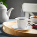 tylish UPPLAGA Cup and Saucer set being used for a cozy coffee momen 50560305