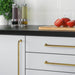 A modern touch for your cabinets – the BAGGANÄS handle in brass-color, measuring 335 mm, adds a stylish and functional element-60338428