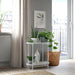 IKEA OLIVBLAD Plant Stand displayed indoors with potted plants