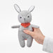 Soft and playful grey/red squeaky toy for kids by IKEA GULLIGAST