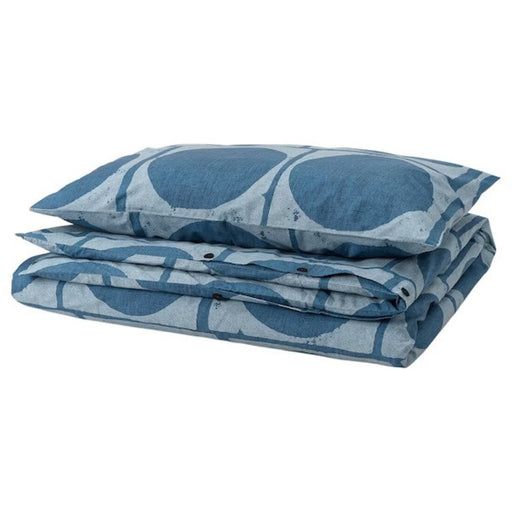 A stylish bedding ensemble featuring a duvet cover and two pillowcases in soothing dark blue and vibrant dark blue shades-60554714