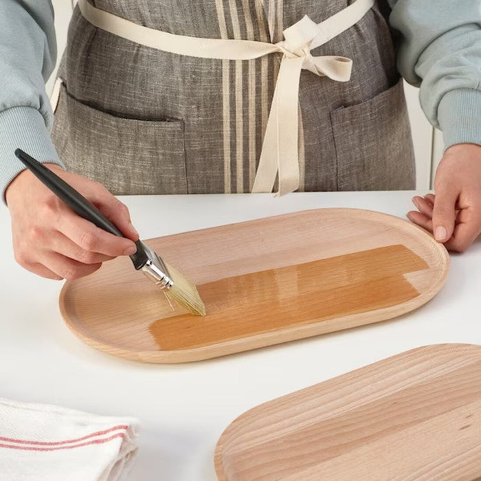 "IKEA's SMÖRLING Serving Tray Set: Beech wood beauty for a timeless and elegant tabletop.