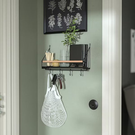Practical use of hooks for hanging keys, bags, and accessories