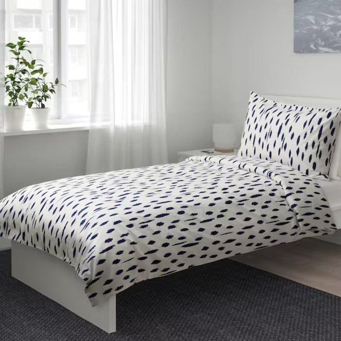 A stylish bedroom upgrade awaits with IKEA's duvet cover and pillowcase set – timeless elegance for any decor."-00444422