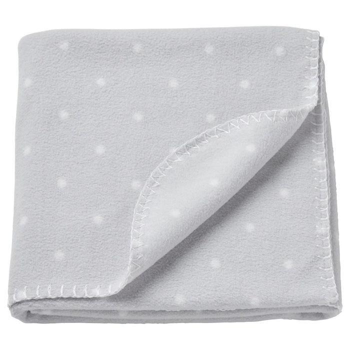 Light grey IKEA LEN blanket with white polka dots, measuring 70x90 cm (28x35 inches), featuring a folded corner and visible stitching along the edges-40496433