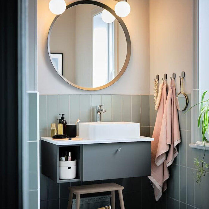 IKEA table lamp with a built-in wireless charger, providing convenience and functionality in a modern and minimalist design. 