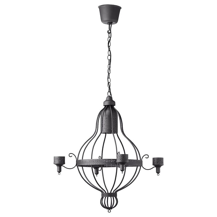 A modern 4-armed chandelier hanging from the ceiling, casting a warm and inviting glow
