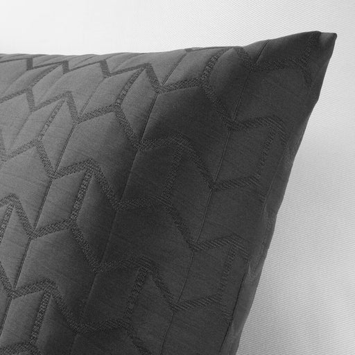 A close-up shot of the texture of the cushion cover, showcasing its softness and durability.  00454963