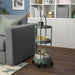 Grey-green IKEA JUTTERSBO rolling trolley with a compact 36x36 cm frame. Features three-tier storage, smooth caster wheels, and a modern design for home organization.60532152