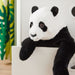 A side view of the IKEA Soft Toy Panda, showcasing its soft and fluffy texture and high-quality craftsmanship.
