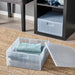 A well-organized shelf with IKEA storage boxes with lids - simplify your storage and stay organized
