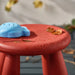 Child-sized red IKEA stool - stable, wipe-clean surface perfect for toddlers at home or outside 80581981