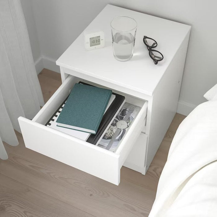 Functional and space-saving 2-drawer dresser, suitable for organizing clothing or office supplies.