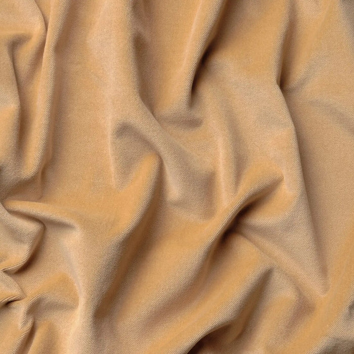 Close-up of SANELA beige curtains by IKEA, showing soft velvet texture and light-blocking fabric. 40561079