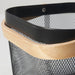Dark grey IKEA RISATORP basket, 25x26x18 cm (9 ¾x10 ¼x7 "), featuring a sturdy black metal mesh body with a natural wooden rim. Modern and functional, ideal for stylish home storage. The close-up highlights the reinforced black metal band with a rivet, showcasing quality craftsmanship. Perfect for kitchen, office, or living room organization.-00588712