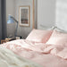 Transform your bedroom with the light pink/white duvet cover and pillowcase set - 150x200 cm-40500699