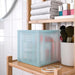 An image of a tidy home with an IKEA lid storage box, providing practical and stylish organization