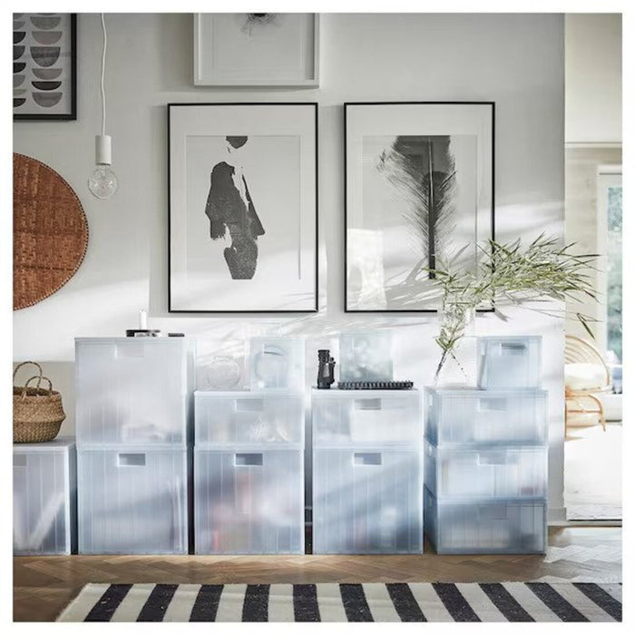 An image of an IKEA storage box with a lid, available in various sizes and colors for versatile storage options.