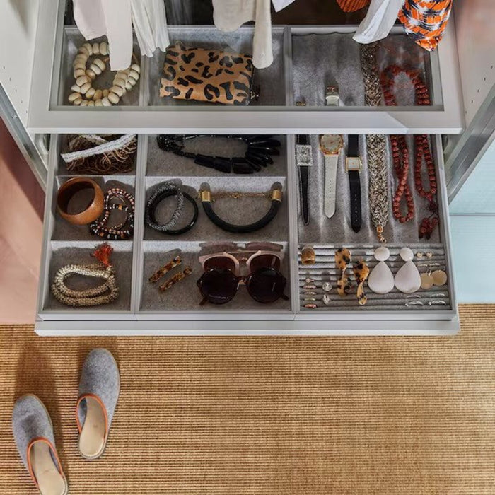 Keep your accessories neatly organized with the IKEA 4-Compartment Insert for a clutter-free closet.