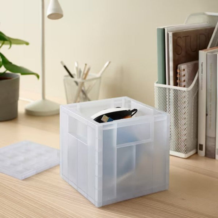 Stacked IKEA storage boxes with lids in various sizes - maximize your storage space